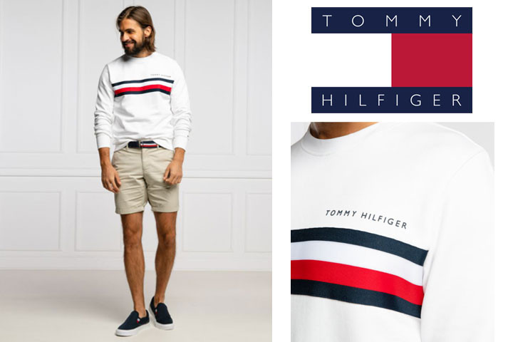Hvid Tommy Hilfiger sweater med mærket tydeligt på forsiden af sweateren1 